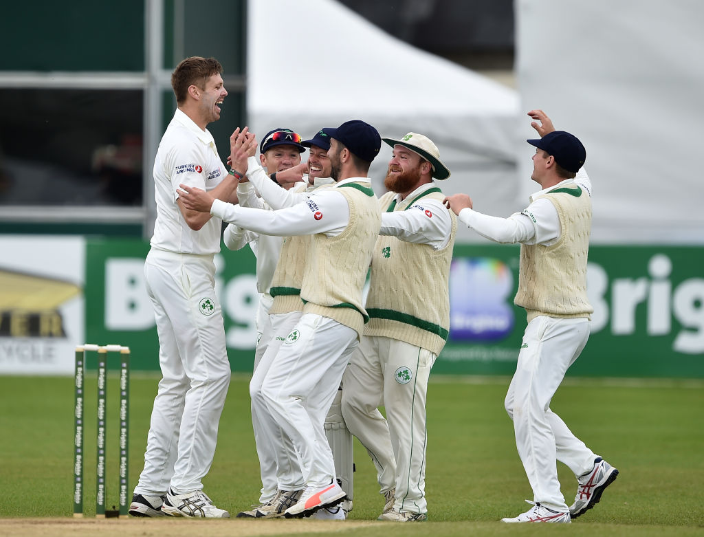 Ireland bowler Boyd Rankin celebrates with team mates after dismissing Pakistan batsman Haris Sohail