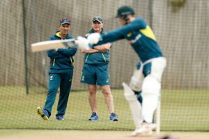 Justin Langer watches on as the Australian team are in the nets