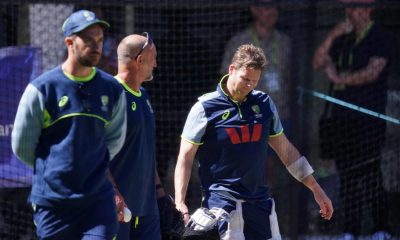 Australia’s Steve Smith looks in pain after being hit by a ball during a nets session