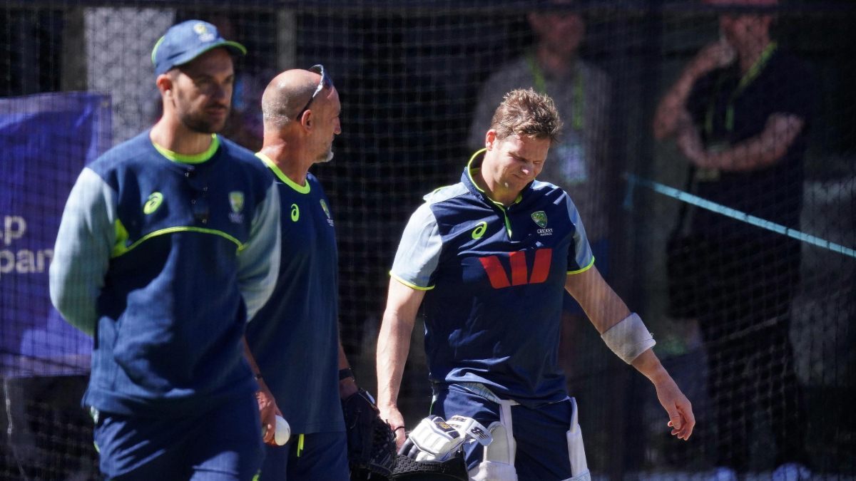 Australia’s Steve Smith looks in pain after being hit by a ball during a nets session