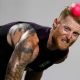 Ben Stokes grimaces while bowling in the nets