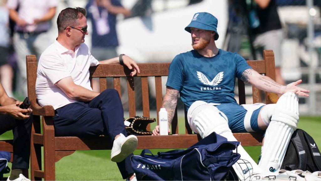 Rob Key (left) talks to England captain Ben Stokes (right).