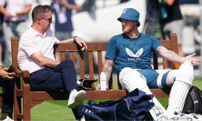 Rob Key (left) talks to England captain Ben Stokes (right).