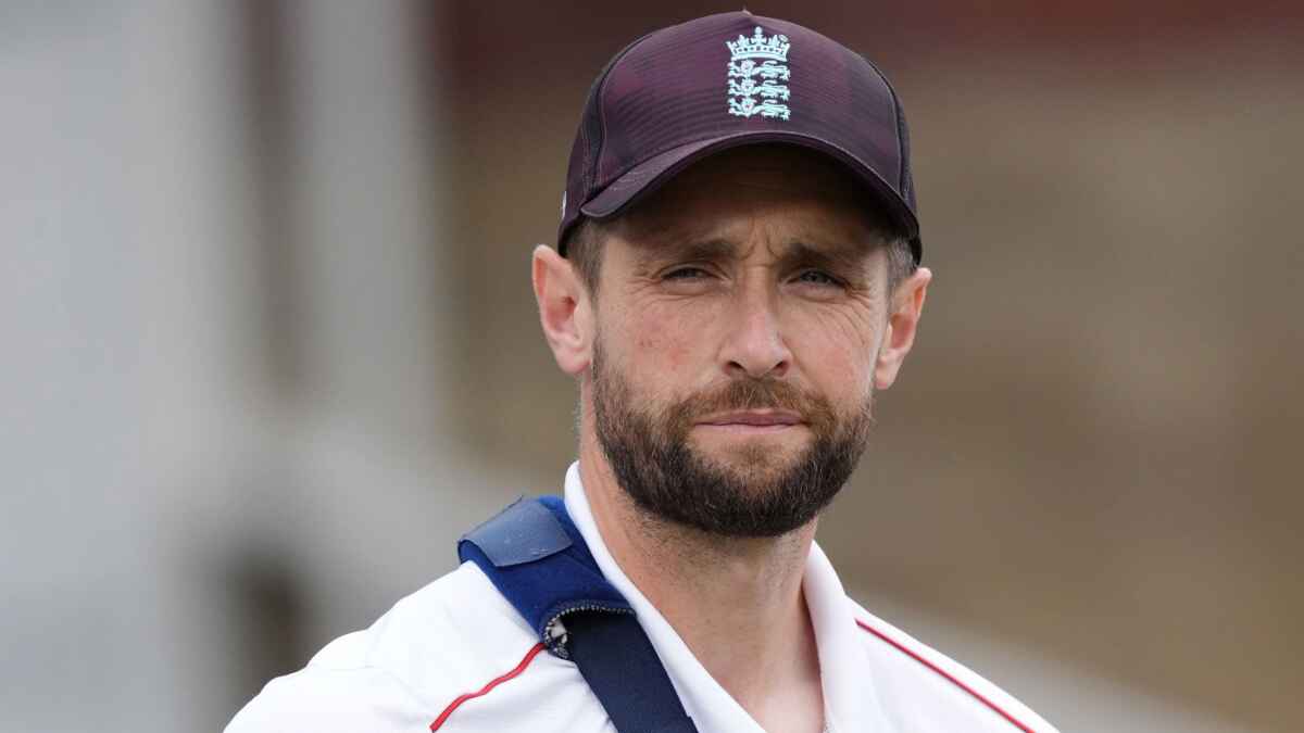 Chris Woakes with his arm in a sling