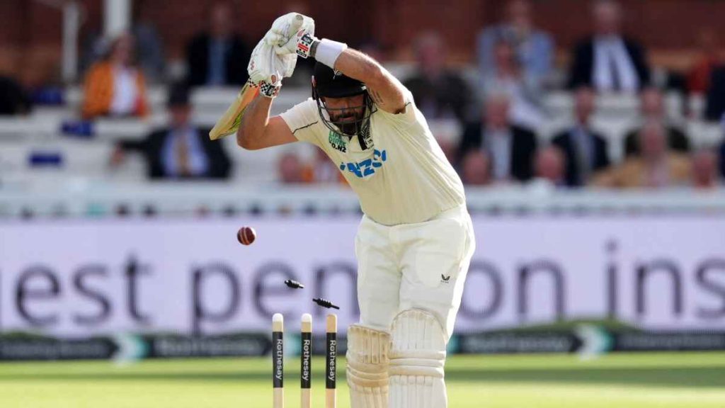 Daryl Mitchell is bowled by Ollie Robinson