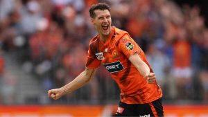 Perth Scorchers’ David Payne celebrates the wicket of Moises Henriques of the Sydney Sixers during the 2025 BBL final