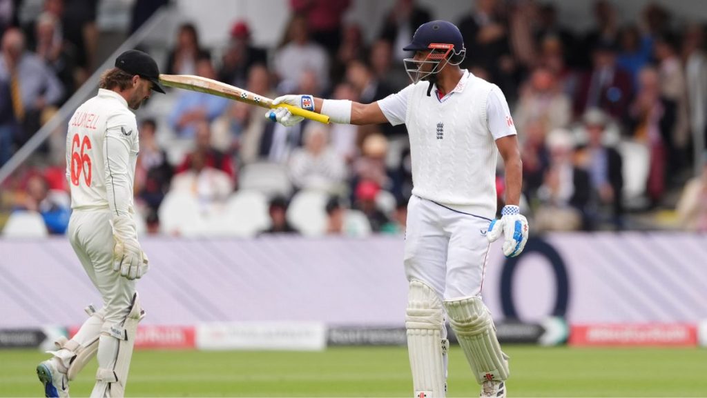 England’s Emilio Gay celebrates reaching 50 runs on day two