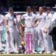 England players look dejected and confused after an unsuccessful review for caught behind
