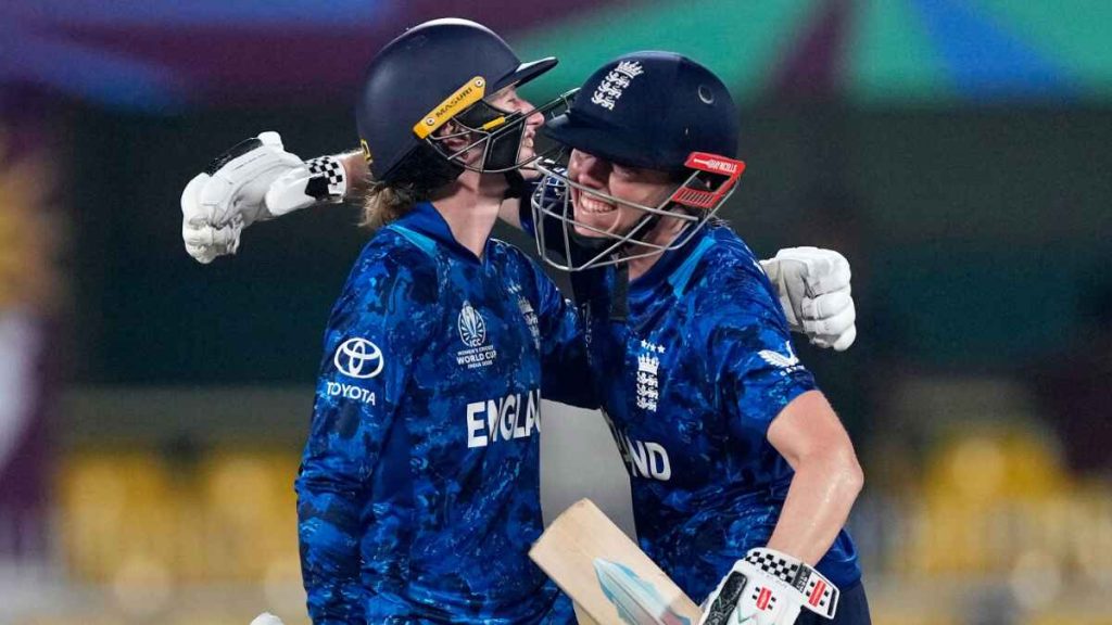 Heather Knight (right) and Charlie Dean (left) embrace after seeing England to victory over Bangladesh.