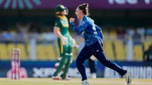 England’s Linsey Smith celebrates the dismissal of South Africa’s captain Laura Wolvaardt, background