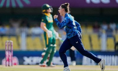 England’s Linsey Smith celebrates the dismissal of South Africa’s captain Laura Wolvaardt, background