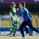 England’s Linsey Smith celebrates the dismissal of South Africa’s captain Laura Wolvaardt, background