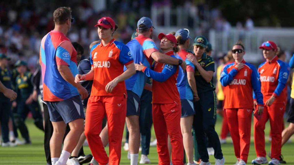 Nat Sciver-Brunt (second left) shakes hands after defeat to Australia in the T20 World Cup final.