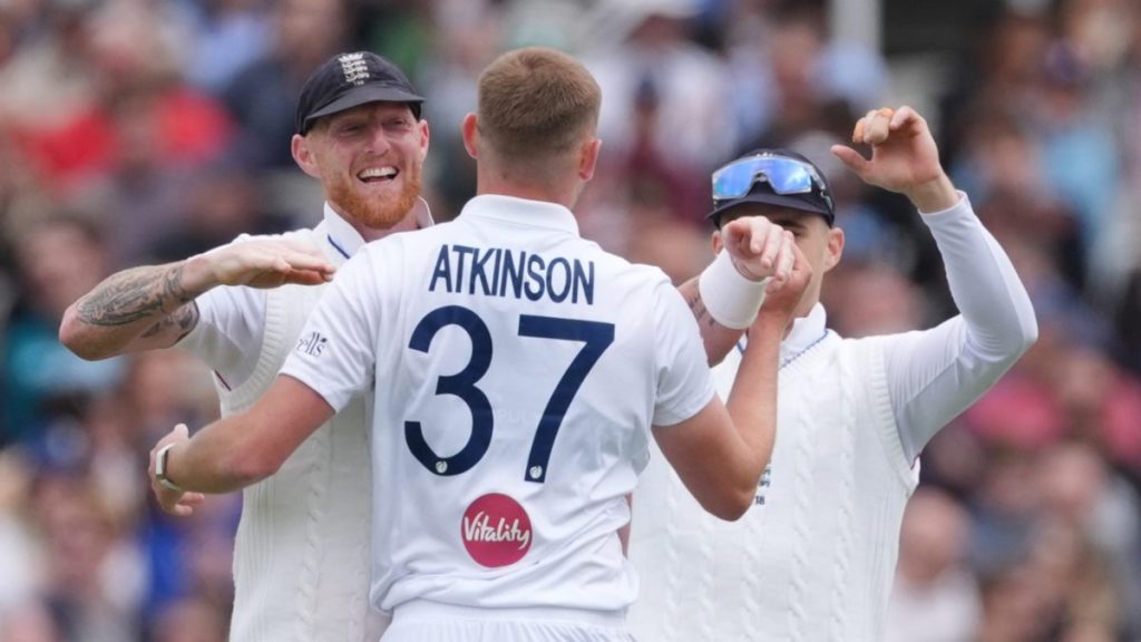 England’s Gus Atkinson, centre, and Ben Stokes, left, celebrate the wicket of New Zealand’s Kyle Jamieson