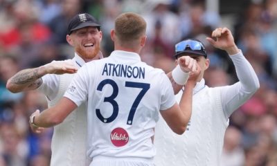 England’s Gus Atkinson, centre, and Ben Stokes, left, celebrate the wicket of New Zealand’s Kyle Jamieson