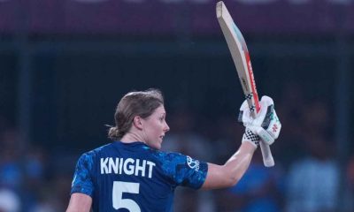 England’s Heather Knight celebrates her century during the World Cup match against India
