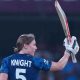 England’s Heather Knight celebrates her century during the World Cup match against India