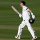 Jack Carson celebrates his century milestone for Sussex against Surrey at The Oval