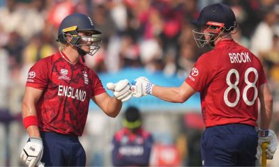 Jacob Bethell punches gloves with Harry Brook