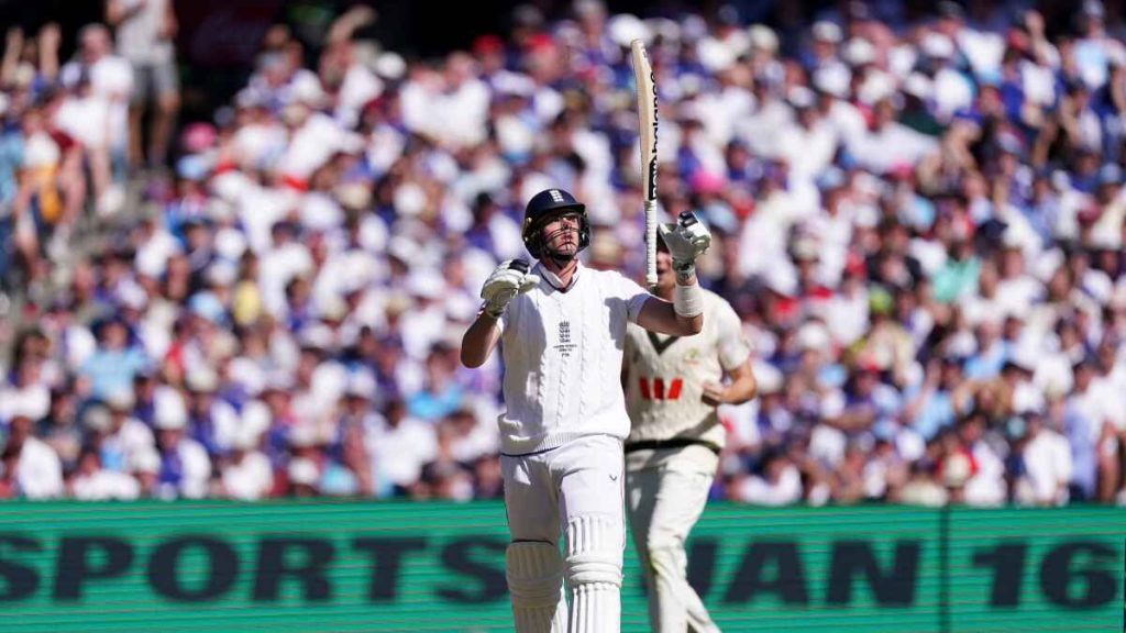 England's Jamie Smith throws his bat in the air