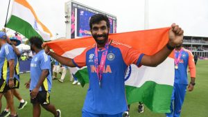 Jasprit Bumrah smiles during a lap of honour after India won the 2024 ICC Men's T20 Cricket World Cup (Philip Brown/Getty Images)