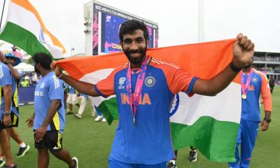 Jasprit Bumrah smiles during a lap of honour after India won the 2024 ICC Men's T20 Cricket World Cup (Philip Brown/Getty Images)