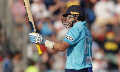 England’s Joe Root celebrates a half century