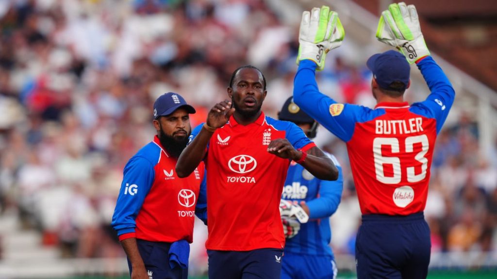 England’s Jofra Archer, centre, celebrates with wicketkeeper Jos Buttler, right, after having Vaibhav Sooryavanshi caught behind