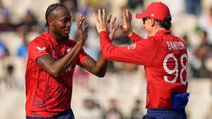Jofra Archer, left, celebrates taking a wicket