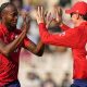 Jofra Archer, left, celebrates taking a wicket