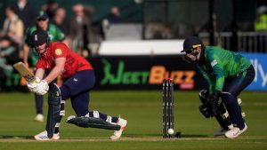 Jordan Cox hits a shot