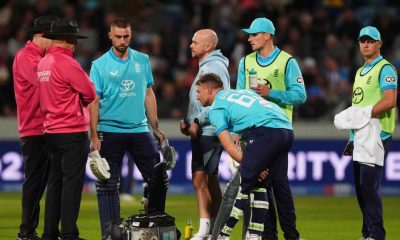 England’s Jos Buttler receives treatment for an injury