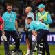 England’s Jos Buttler receives treatment for an injury