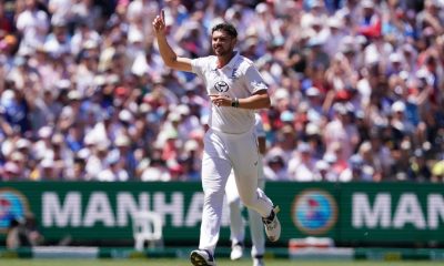Josh Tongue celebrates a wicket