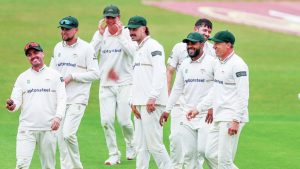 Fun for Foxes: the Leicestershire players come together after another wicket for Ian Holland (without a cap) PICTURES: Alamy