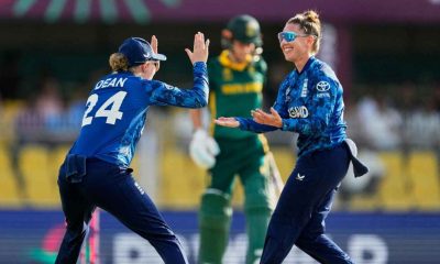 Linsey Smith, right, celebrates the dismissal of South Africa’s Marizanne Kapp with team-mate Charlie Dean