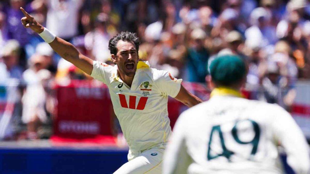 Mitchell Starc celebrates taking the wicket of England’s Zak Crawley