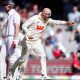 Nathan Lyon celebrates the wicket of England’s Ben Stokes on day four