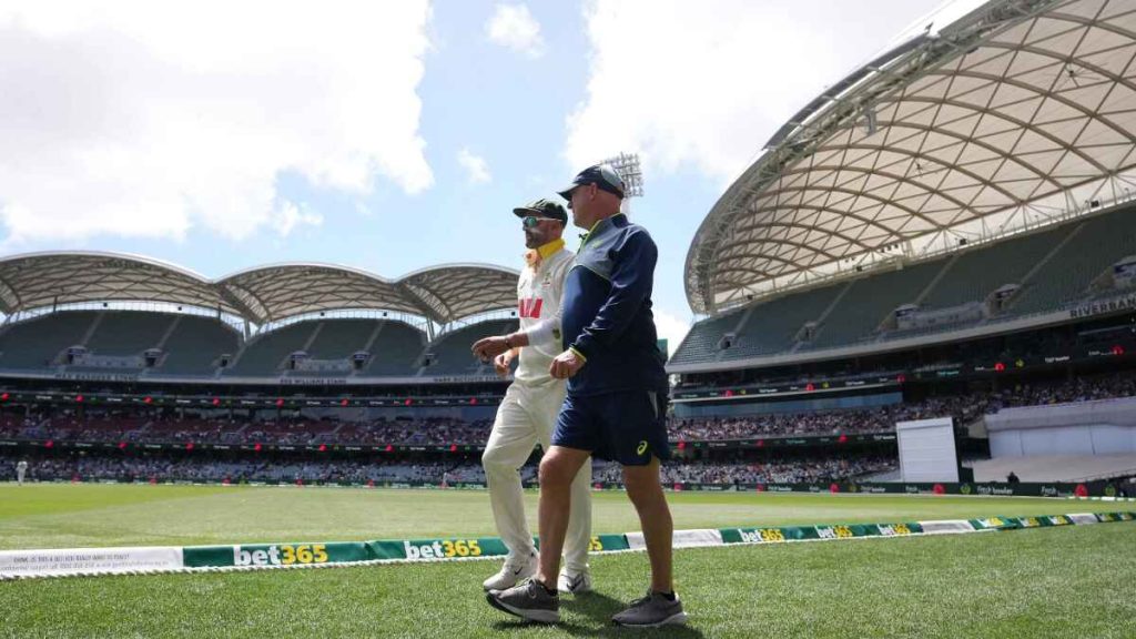 Nathan Lyon (left) walks off the ground after picking up an injury (Robbie Stephenson/PA)