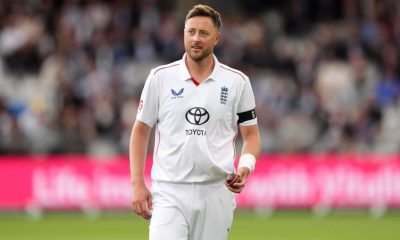England’s Ollie Robinson walks back to his bowling mark on day one of the first Test at Lord’s