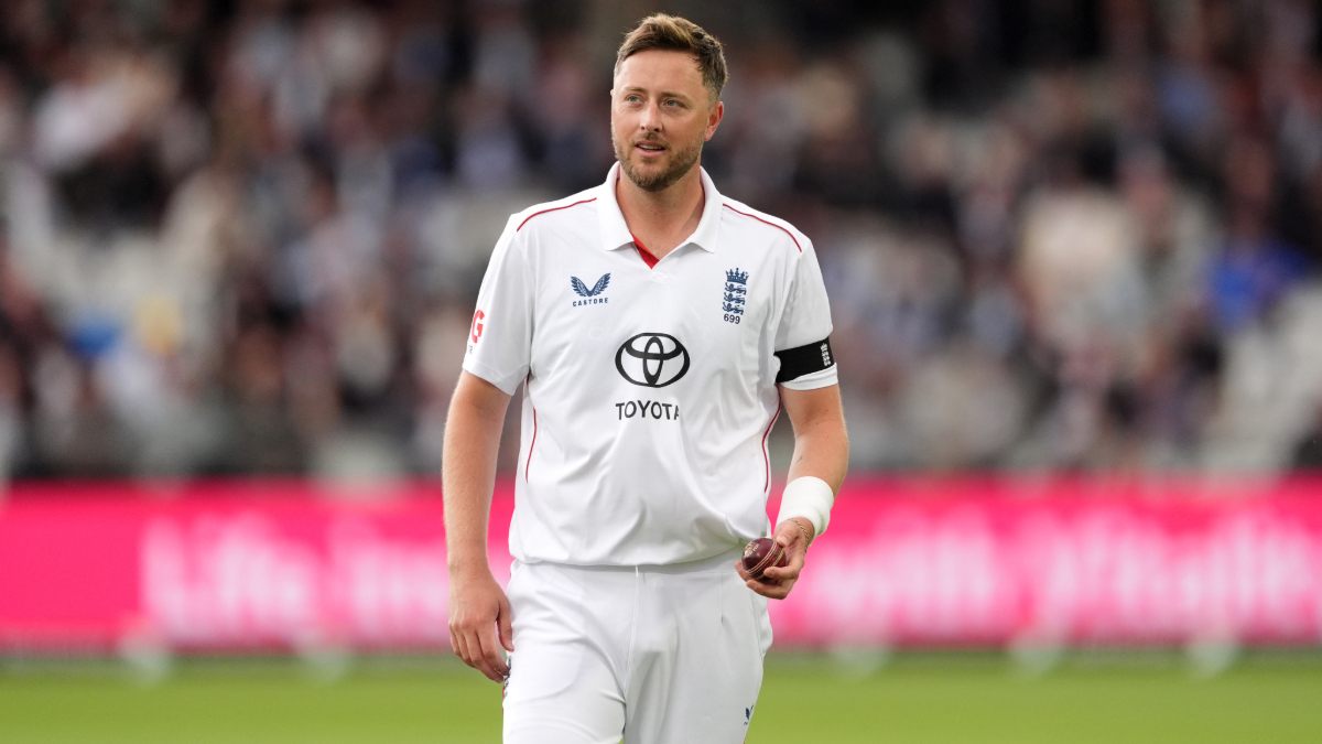 England’s Ollie Robinson walks back to his bowling mark on day one of the first Test at Lord’s