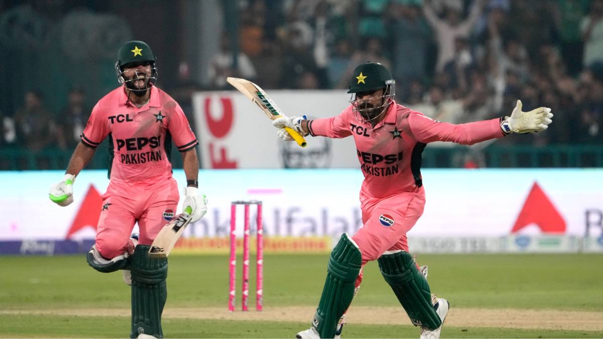 Shadab Khan and Haris Rauf celebrate Pakistan’s victory.