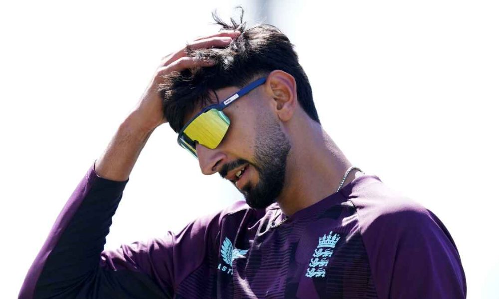 England’s Shoaib Bashir puts his hand to his head in training.