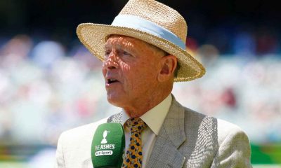 Former England captain Sir Geoffrey Boycott speaking into a microphone.
