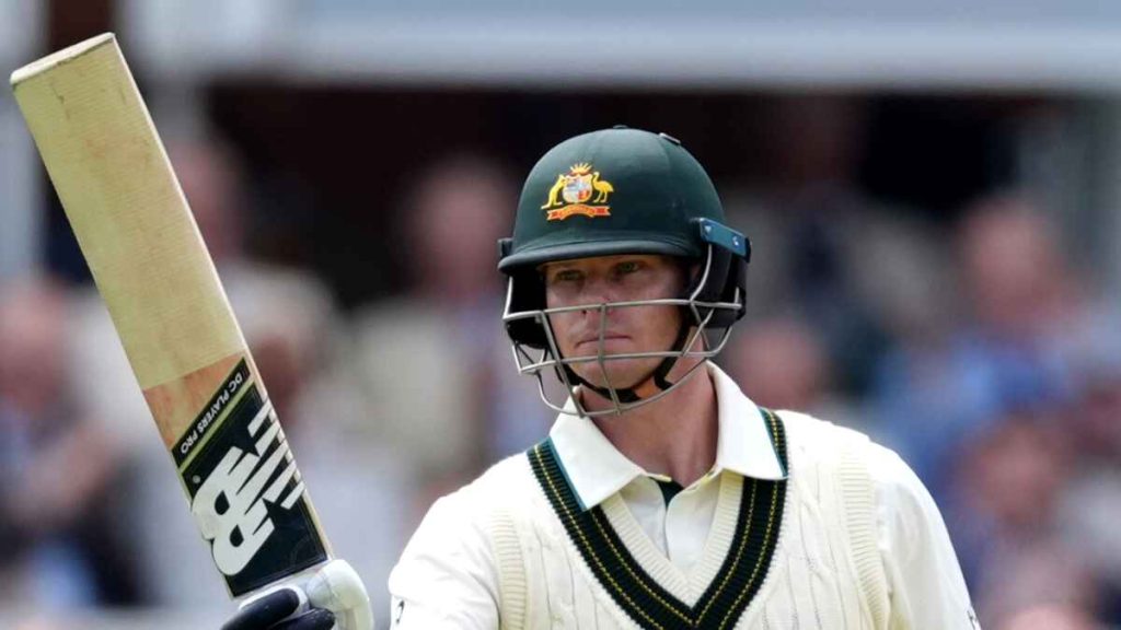Australia's Steve Smith raises his bat after a half-century