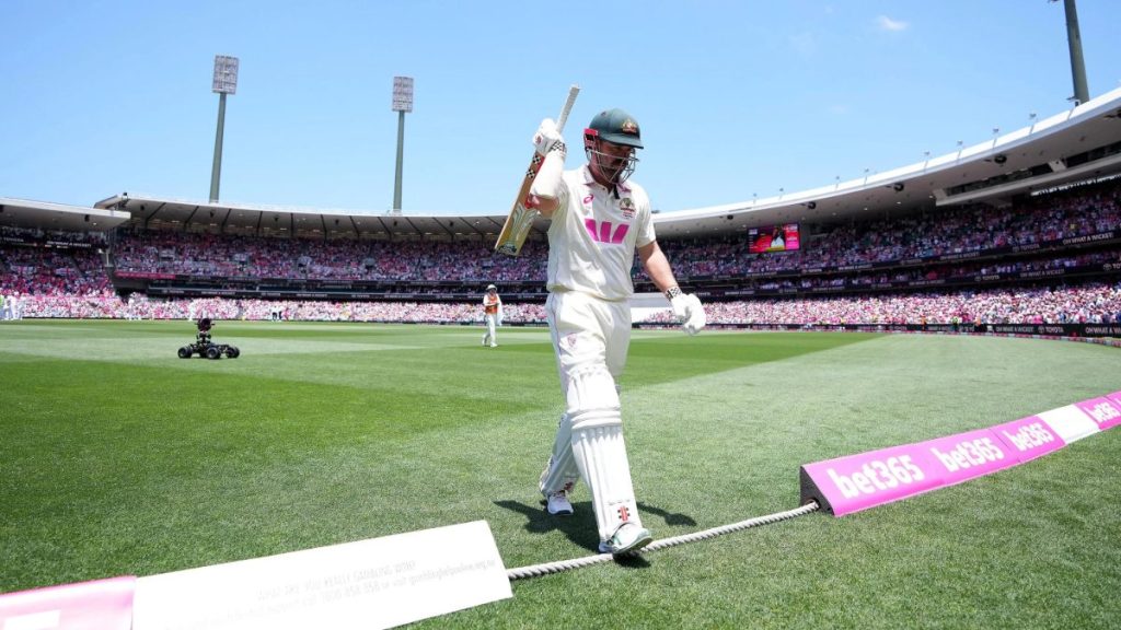 Australia’s Travis Head walks off the ground after being dismissed for 163