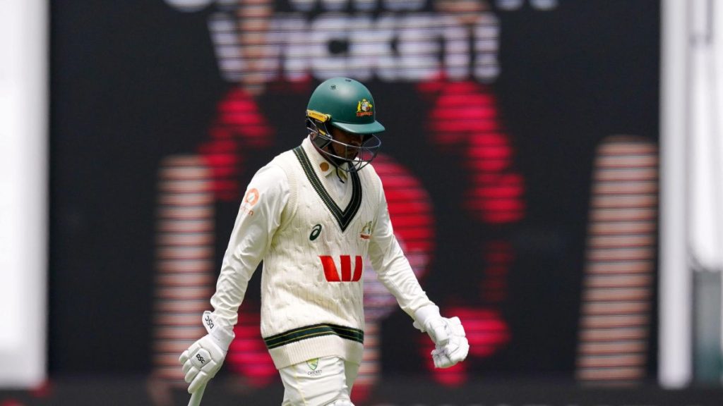 Usman Khawaja walks off after being dismissed in the fourth Ashes Test.