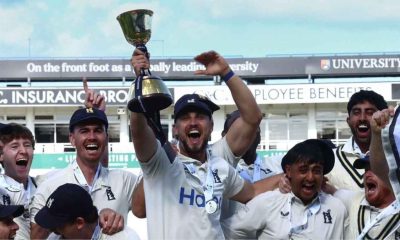 Warwickshire’s captain Ed Barnard lifts the County Championship trophy