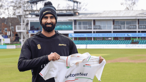 Yadvinder Singh poses with his Leicestershire shirt after signing a short-term deal at Grace Road.